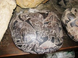 Ica stone depicting dinosaurs
